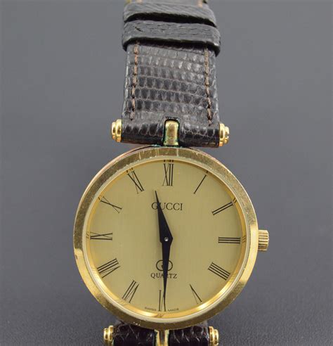 gucci watch women black gold vintage|gucci old model watches.